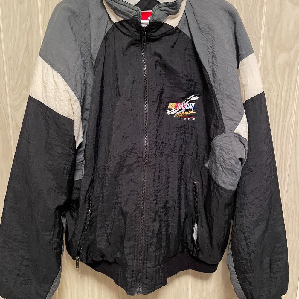 NASCAR SKI JACKET MUTI COLORED XLARGE MADE BY SWINGSTER.
